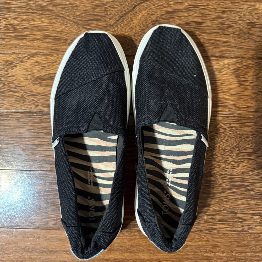 Toms Black and White Slip-On Shoes